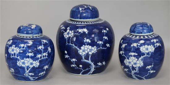 A Chinese ginger jar and cover and a similar matching pair (3)